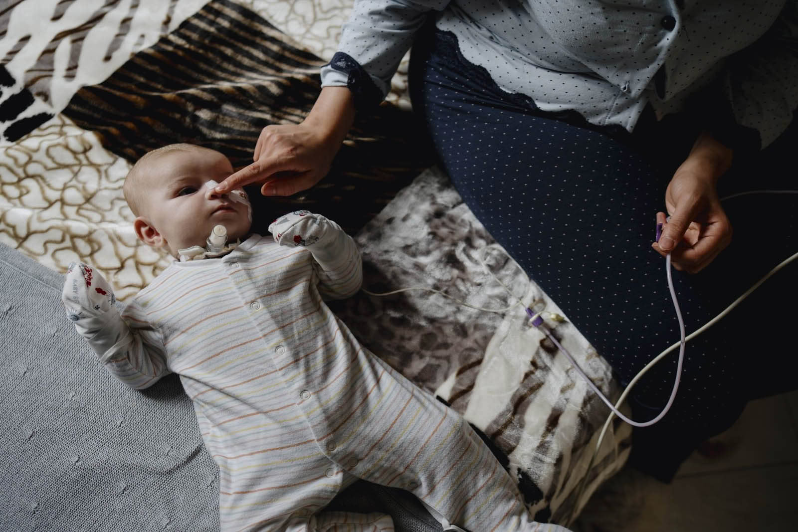 Mum touching baby's nose