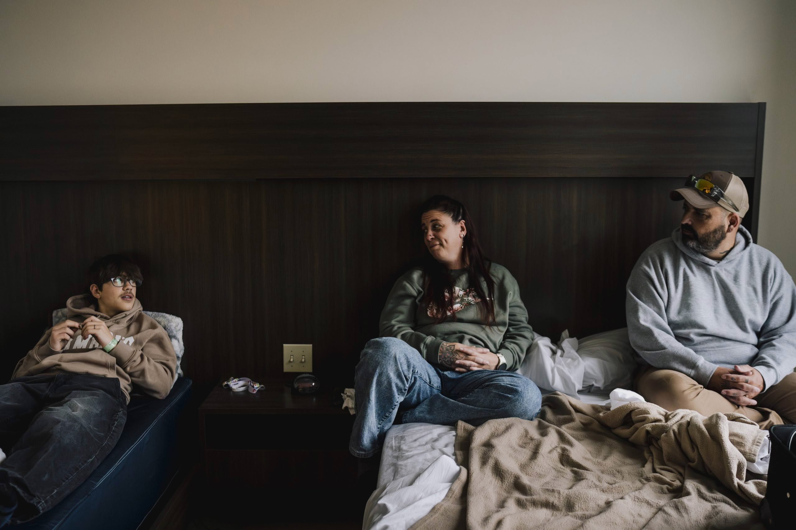 Family relaxing in Ronald McDonald House room